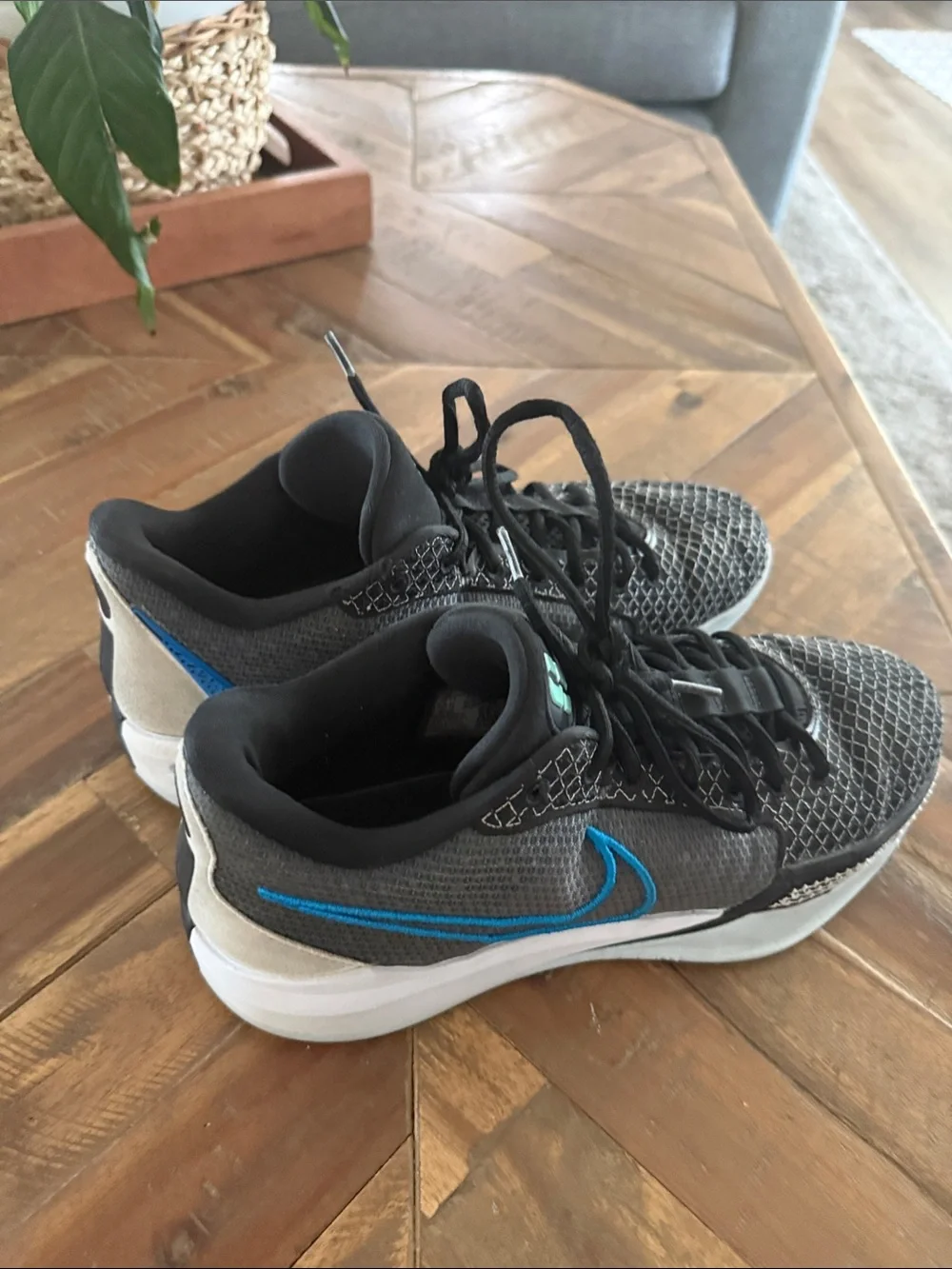 Nike Men’s Gray Athletic Shoes with Blue Swoosh